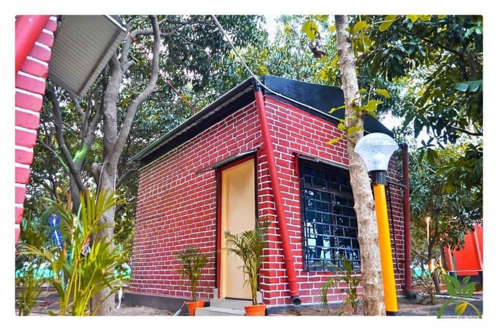 Hotel Modhubon Agro Tourism Bolpur Esterno foto